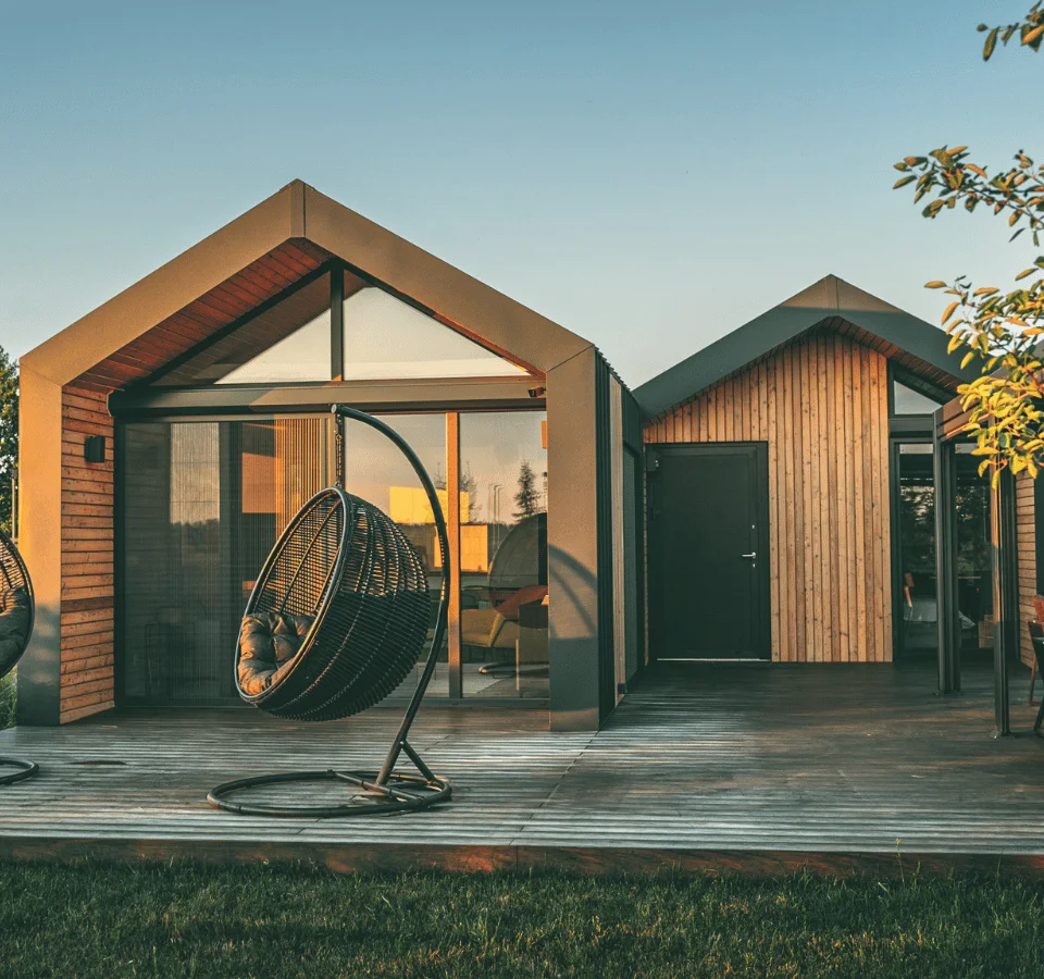 stuga tiny house with terrace and chairs