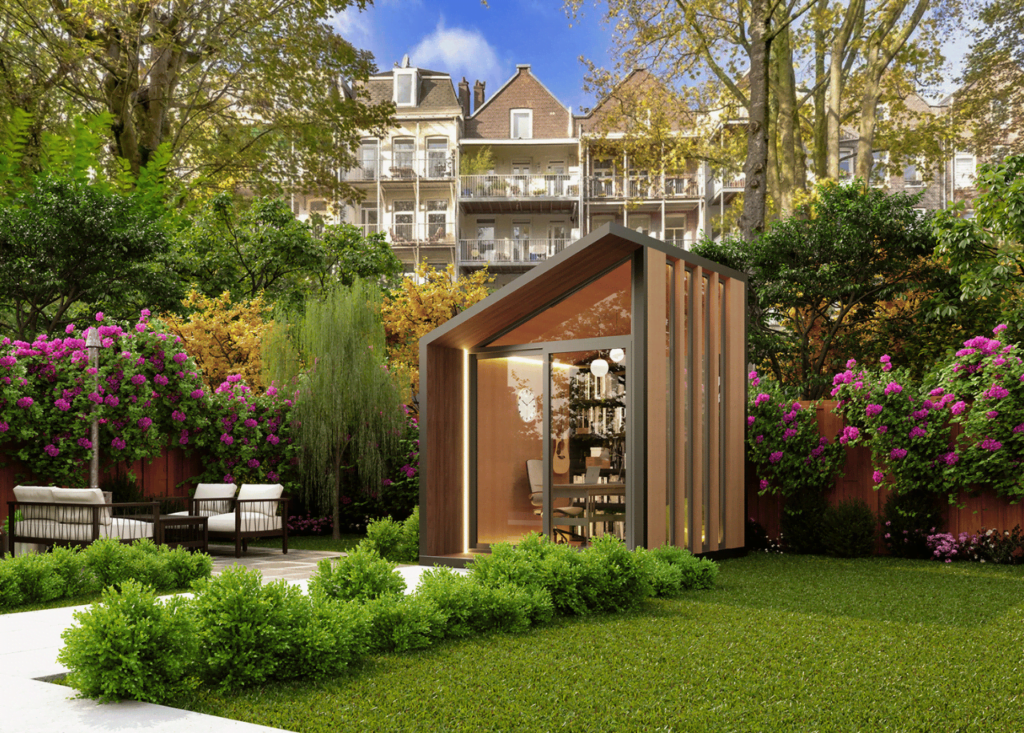 Garden office in the backyard, large windows, green grass, wooden finish