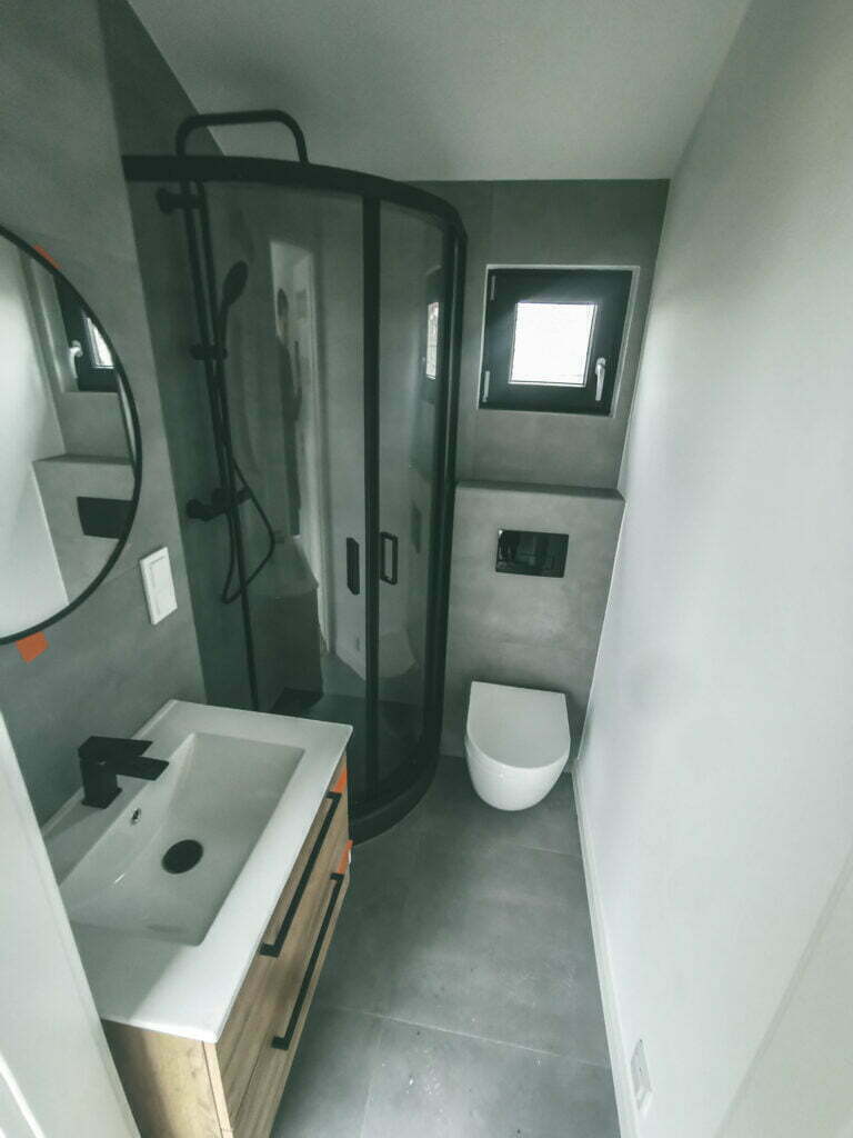 Black and Grey Finished Bathroom, Shower Cabin, Toilet, Sink with Mirror