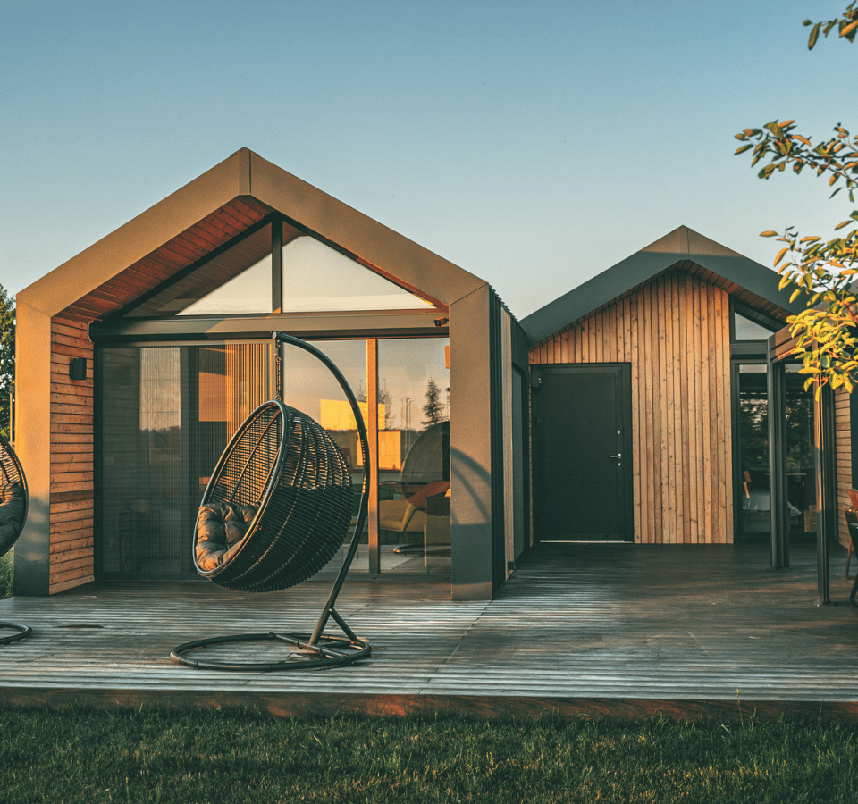 Luxury Stuga Tiny House with a Wood and Steel finishing, an ideal blend of elegance and outdoor living.