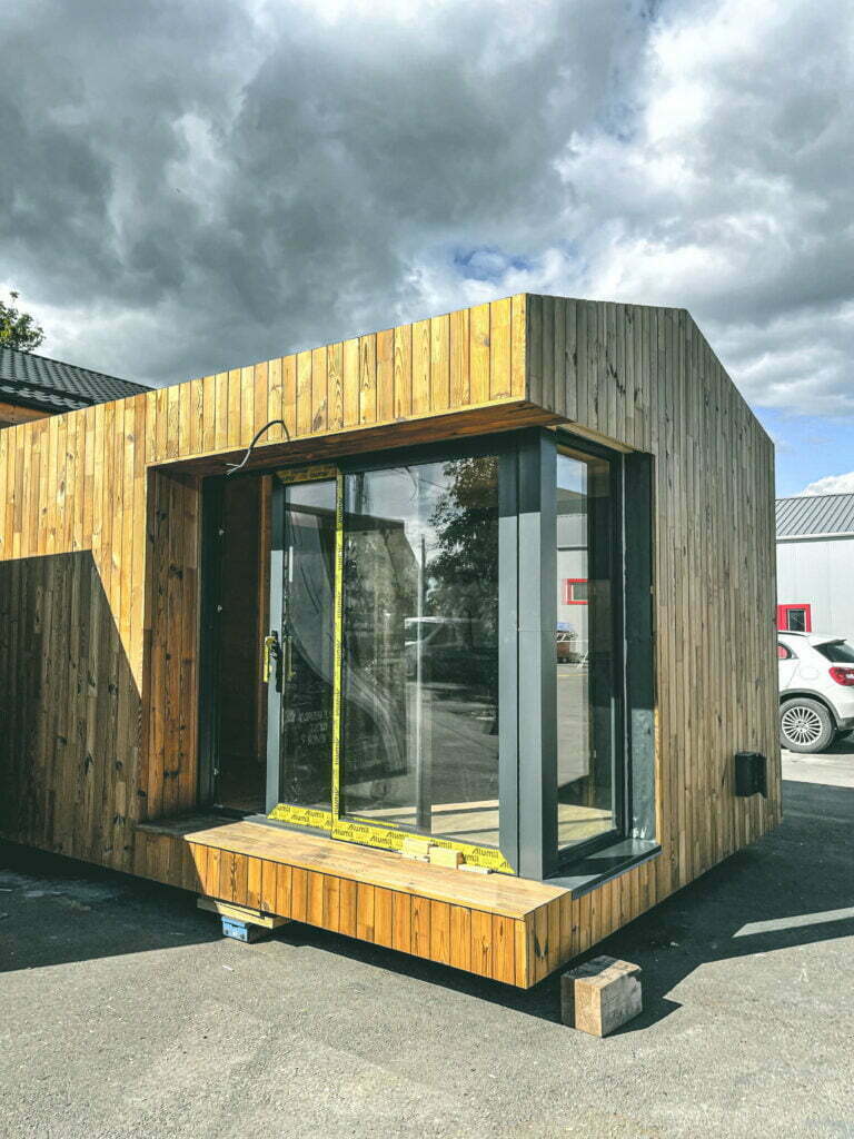 wooden custom tiny house with big window