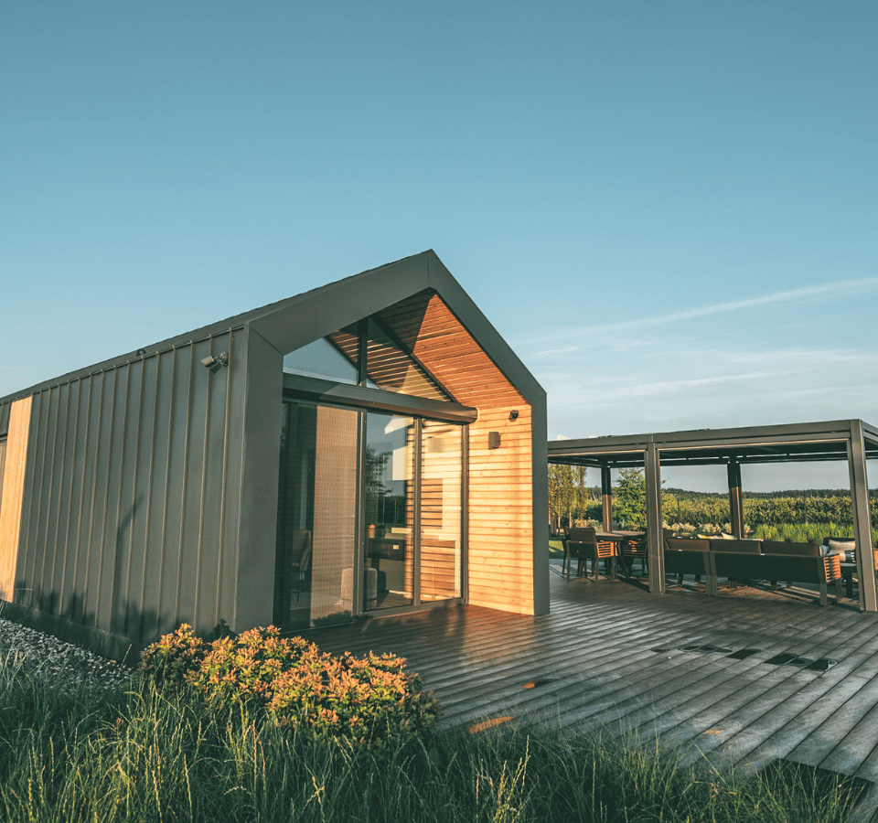 stuga tiny house with wooden terrace