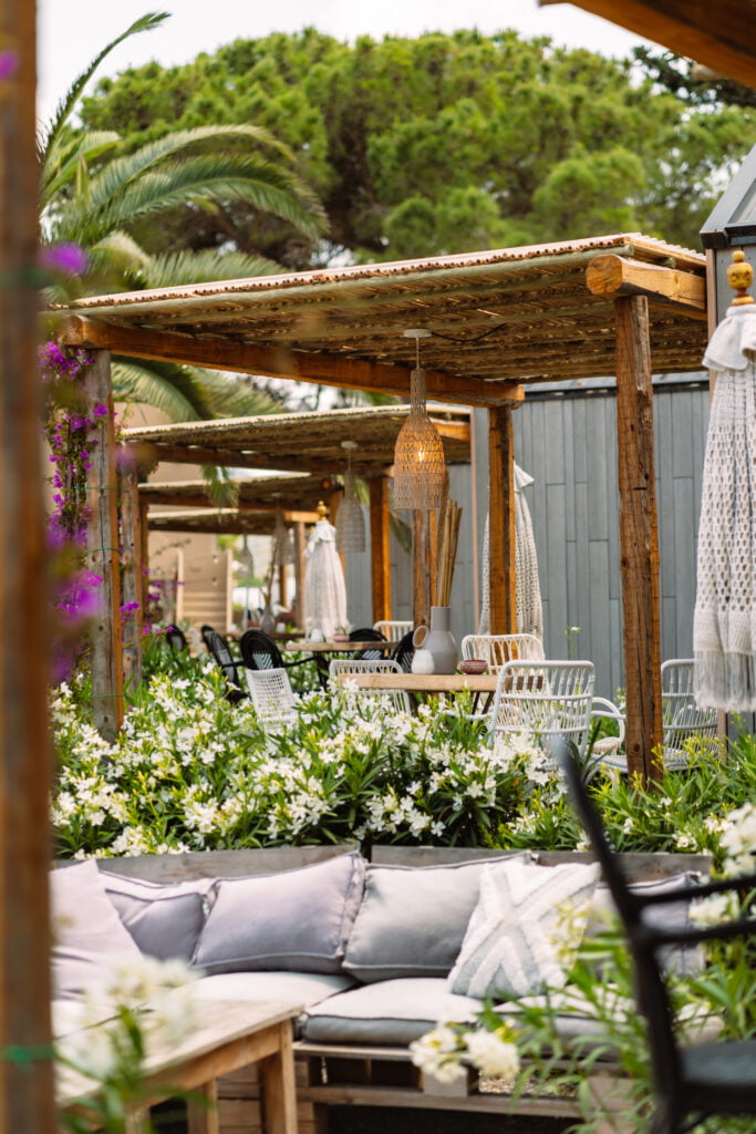 ibiza terrace, sofa, wooden terrace, flowers, green tree