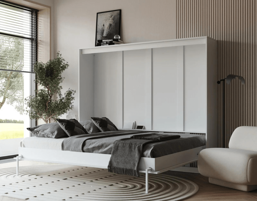 Murphy bed is unfolded, queen-size bed, pillows and blanket, modern finishes.
